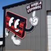 Acm Sign Xenix Mascot Se Habla Espanol Xenix Graphics mascot sign with Se Habla Español at the Xenix Graphics shop in Dumas, TX