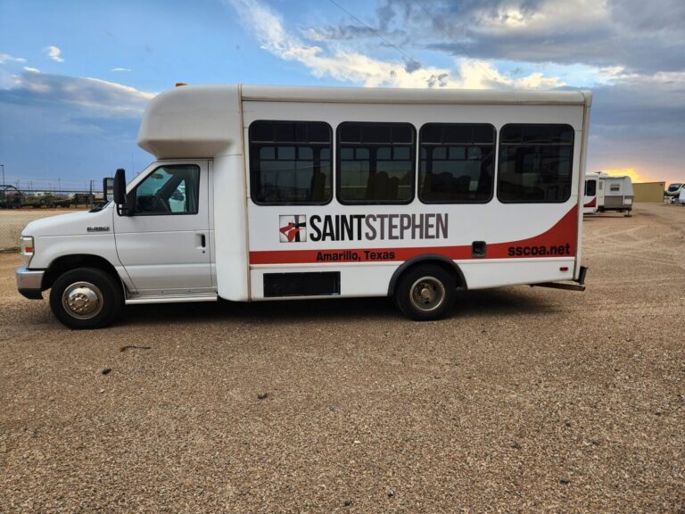 Shuttle bus lettering and striping by Xenix Graphics