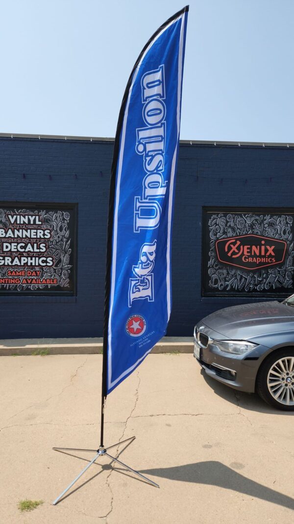 Feather Flags Eta Upsilon Eta Upsilon feather flag outside the Xenix Graphics shop in Dumas, TX