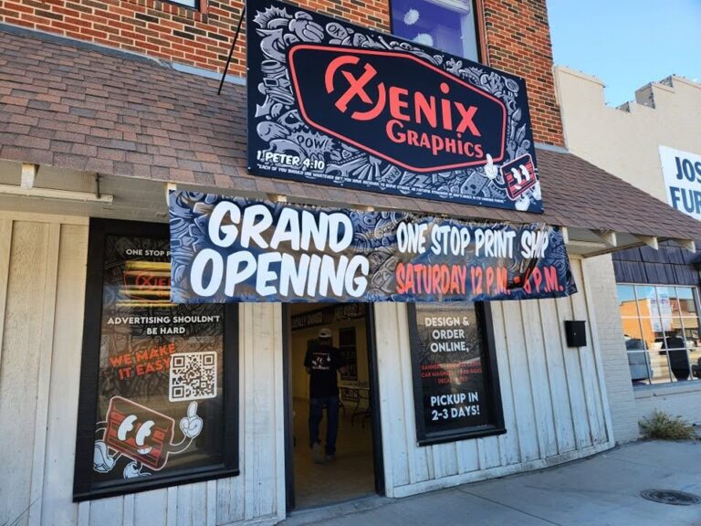 Grand Opening banner and sign on the Xenix Graphics storefront