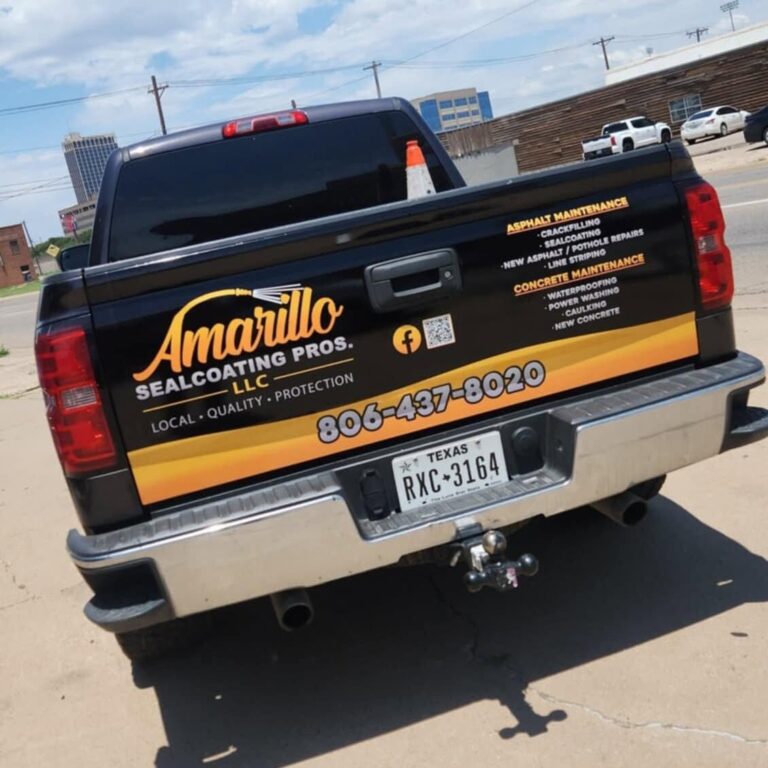 Amarillo Sealcoating Pros tailgate graphics on a black pickup by Xenix Graphics