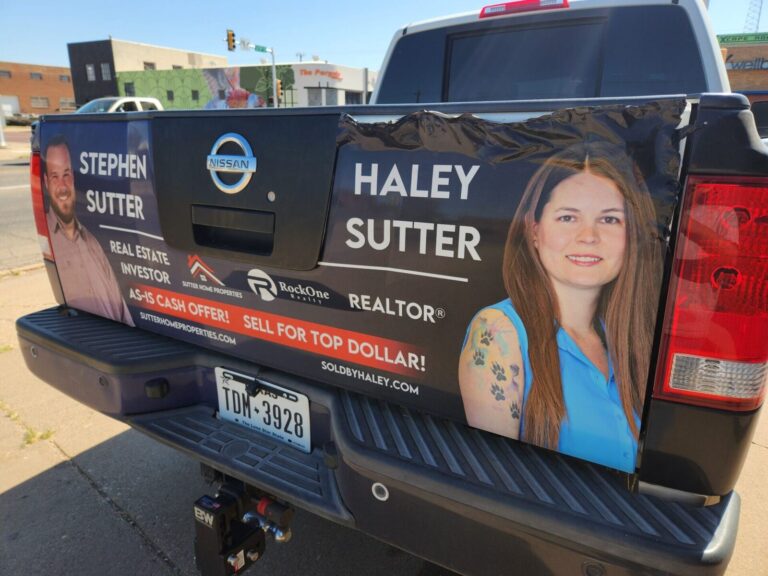 Printed vinyl tailgate wrap for a realtor's pickup truck by Xenix Graphics