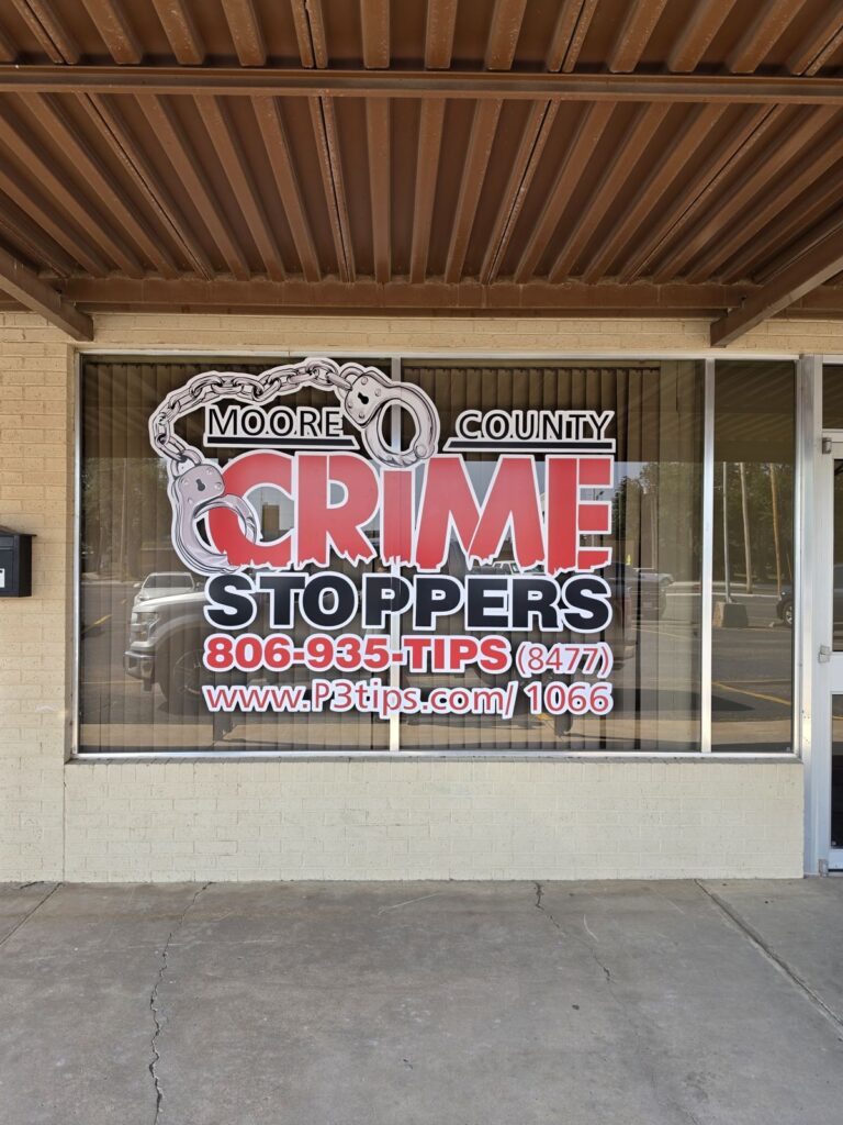 Moore County Crime Stoppers window graphics, made by Xenix Graphics